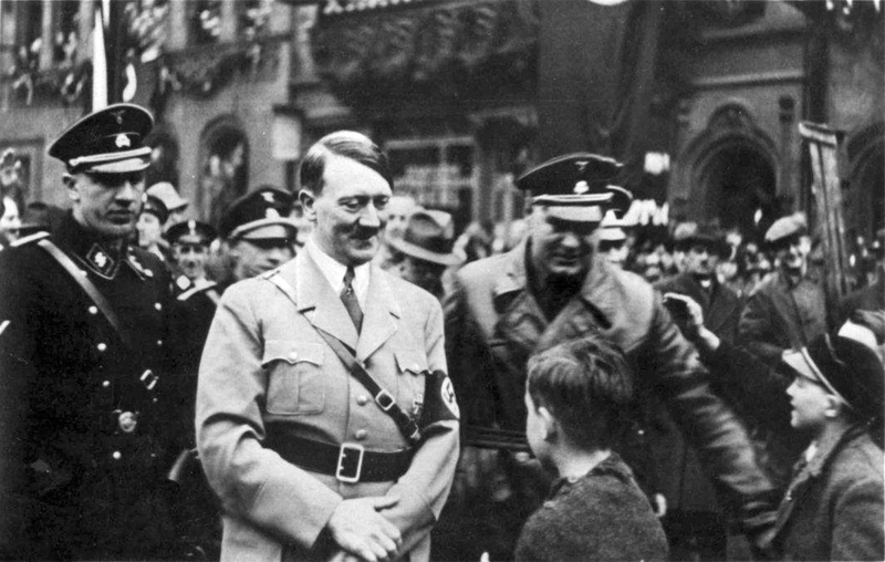 Adolf Hitler in Saarbrücken Saarland is welcomed by a young boy